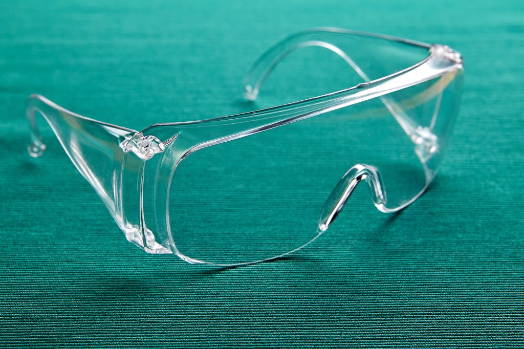 Protective eyewear, plastic eye protection glasses for medical staff during the covid-19 pandemic.
